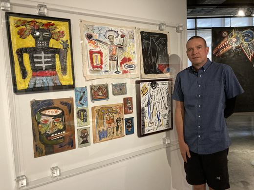 Matt with the Basquiat wall, October 4, 2021.