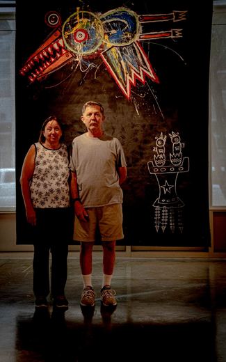 Lenders Denise and Mike Stevens with "Fleeing the Roost" (2008).