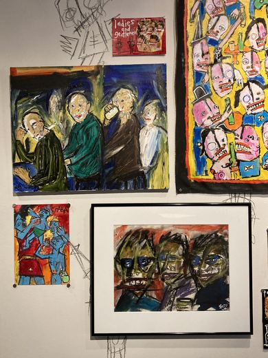 Icons drawn directly on the gallery walls.