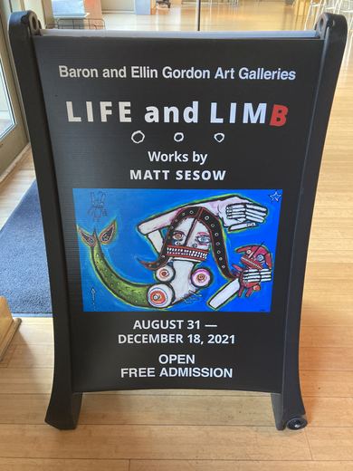 Sidewalk sign for the exhibition.