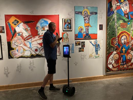 Gordon, the galleries' telepresence robot, carried remote visitors on the tour.