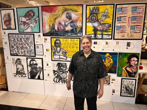 June 21: collector Jeff Brivic with some of his Sesow and Dana Ellyn collection, on view at the Beverly Center through July 20.