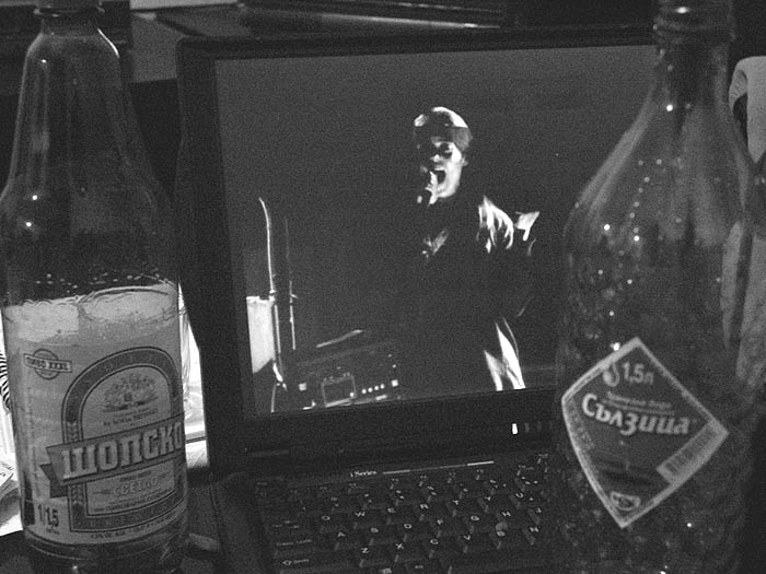 “Sesow’s Sofia, Bulgaria studio 2004.” A laptop, two Bulgarian beer bottles and a painting in progress.