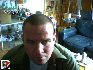 A frame from the studio webcam, “turned on sometimes during painting.”