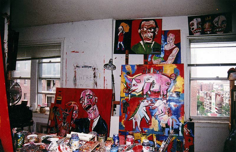 The studio windows over Adams Morgan, walls full of new paintings.
