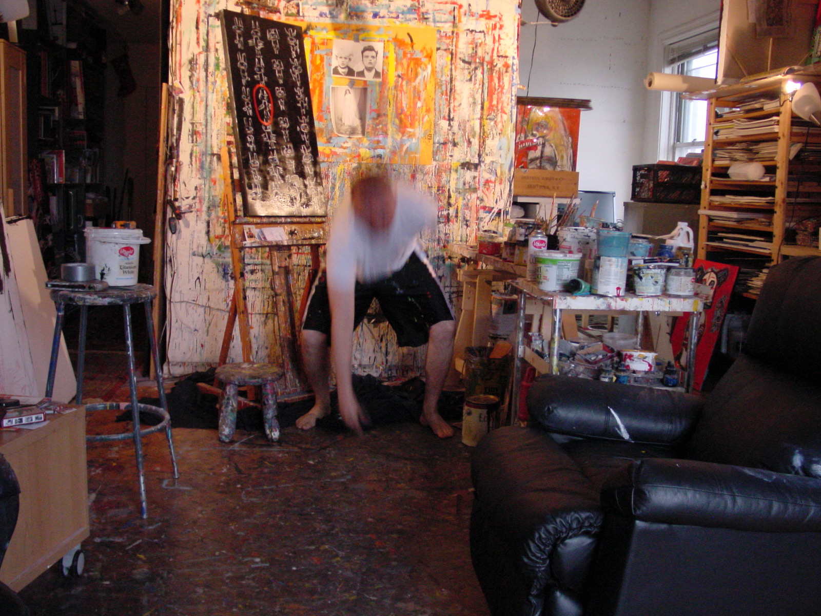 Matt Sesow painting in the Adams Morgan studio, October 2008, frame 2 of 4