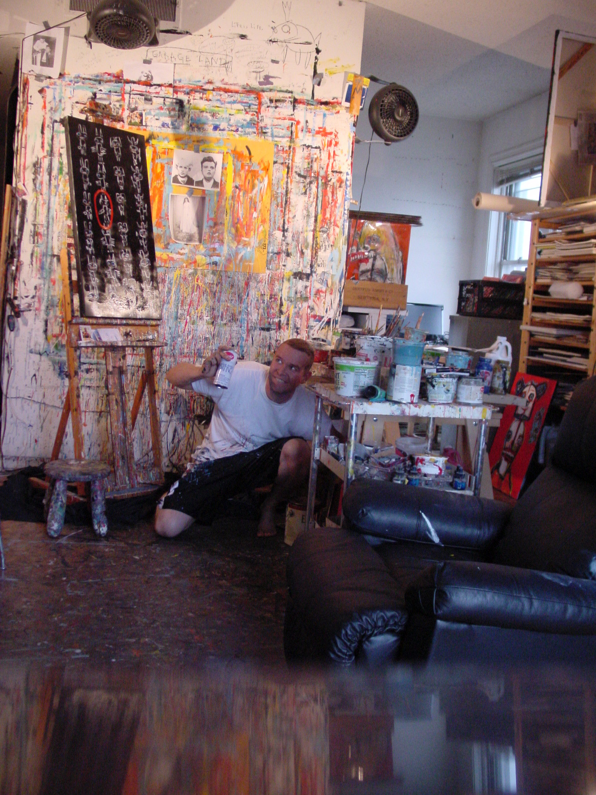 Matt Sesow painting in the Adams Morgan studio, October 2008, frame 4 of 4